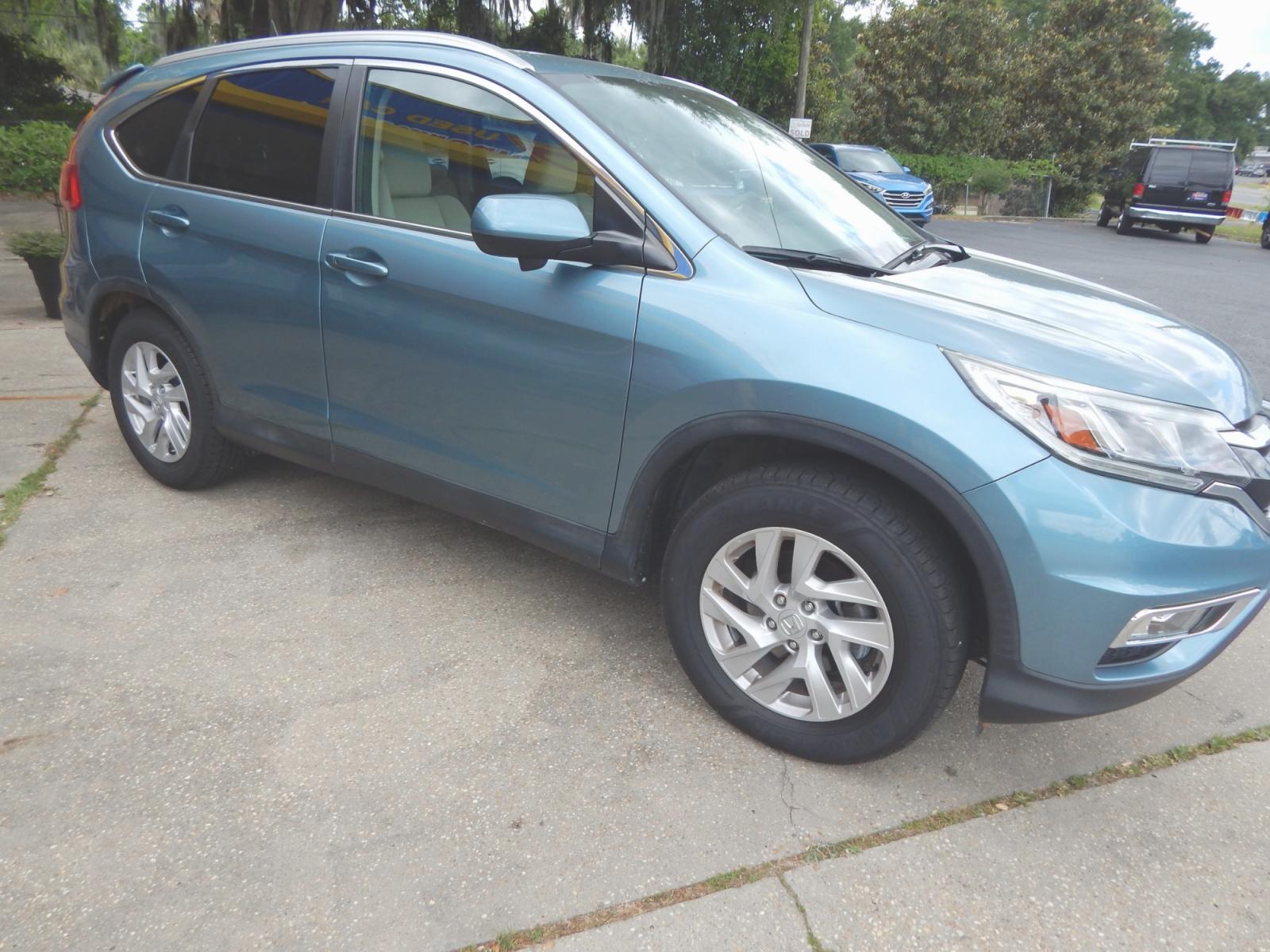 2015 Teal /Tan Honda CR-V (2HKRM3H53FH) with an 2.4L 4 cyl. engine, Automatic transmission, located at 3120 W Tennessee St, Tallahassee, FL, 32304-1002, (850) 575-6702, 30.458841, -84.349648 - Used Car Supermarket is proud to present you with this loaded immaculate 2015 Honda CRV EX with sunroof and low miles. Used Car Supermarket prides itself in offering you the finest pre-owned vehicle in Tallahassee. Used Car Supermarket has been locally family owned and operated for over 48 years. Ou - Photo #1